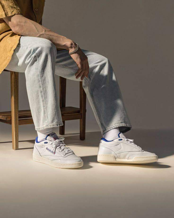 Man wearing Reebok Club C sneakers
